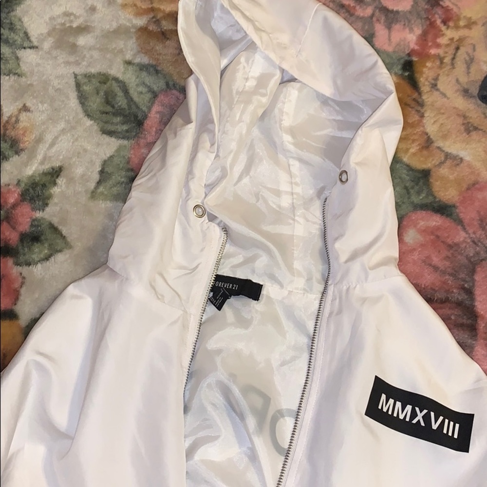 white windbreaker.